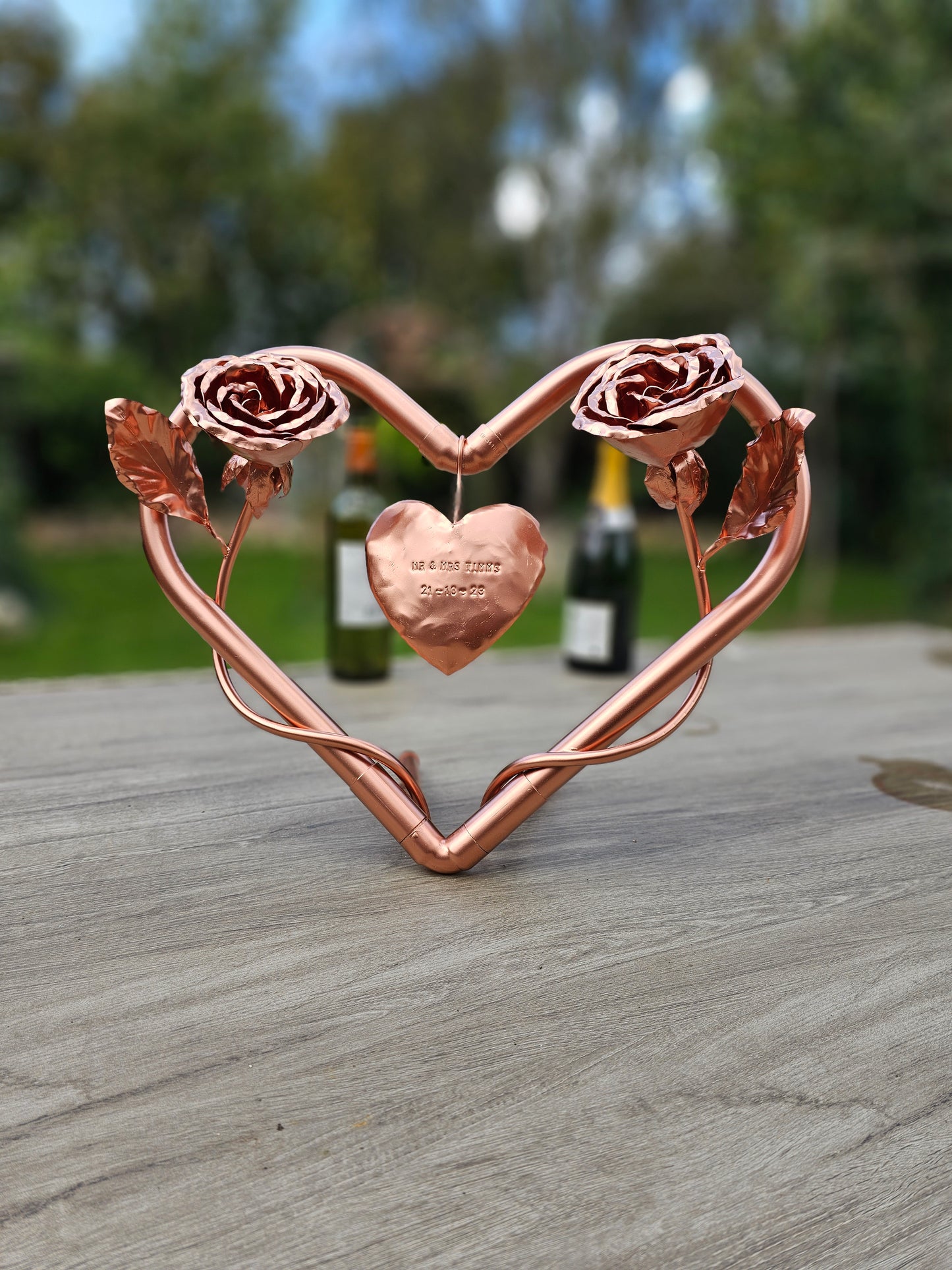 Twin Roses entwined with copper heart