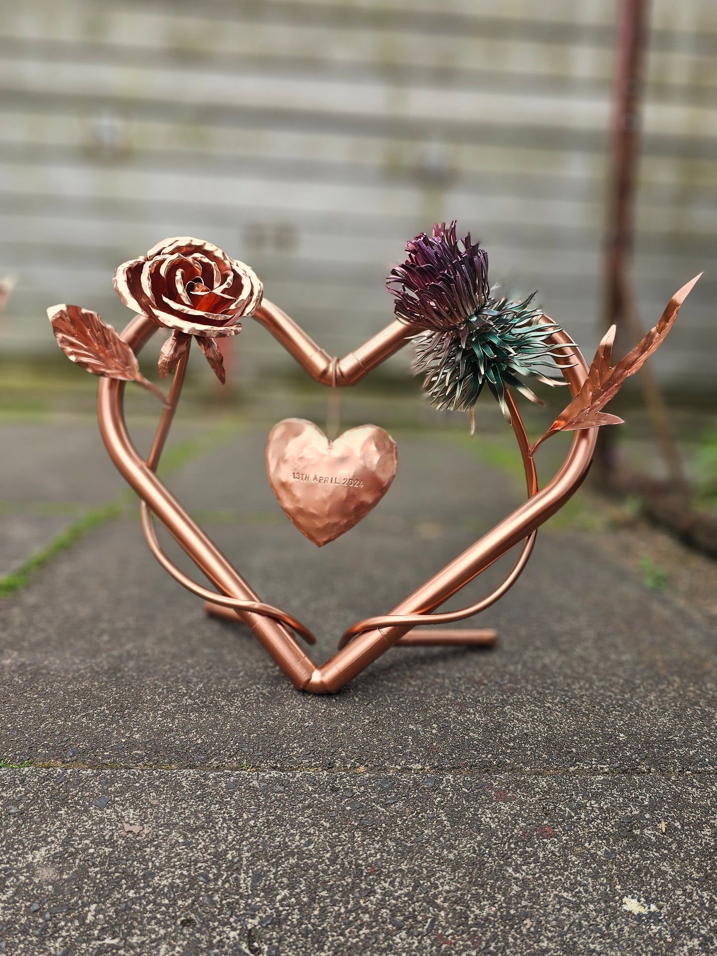 Twin Roses entwined with copper heart